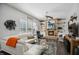 Comfortable living room featuring a stone fireplace, built-in shelves, and ample seating for relaxation at 106 Mesquite Dr, Durham, NC 27703
