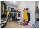 Walk-in closet with ample storage space including shelving and hanging rods for clothes and accessories at 106 Mesquite Dr, Durham, NC 27703