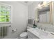 Bright bathroom features a modern vanity and natural light at 108 Westport Dr, Cary, NC 27511
