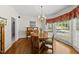 Dining room featuring hardwood floors and an abundance of natural light at 108 Westport Dr, Cary, NC 27511