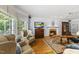 Inviting living room with a bay window, a fireplace, and comfortable seating at 108 Westport Dr, Cary, NC 27511