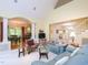 Bright living room has access to the kitchen and a stairway to the second floor at 110 Blackford Ct, Durham, NC 27712