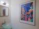 Elegant powder room featuring vessel sink and modern wall art at 110 Blackford Ct, Durham, NC 27712