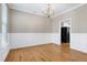 Formal dining room with hardwood floors, wainscoting, and a chandelier at 120 Shore Pine Dr, Youngsville, NC 27596