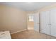 Cozy bedroom featuring neutral walls, a closet, and plush carpeting for a relaxing retreat at 1208 Copper Creek Dr, Durham, NC 27713