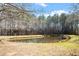 Picturesque pond surrounded by lush greenery, offering a serene and natural setting at 1208 Copper Creek Dr, Durham, NC 27713