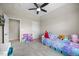 Bedroom features carpet, vaulted ceiling, ceiling fan, and a window view at 121 Talley Ridge Dr, Holly Springs, NC 27540