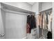 Walk-in closet with shelving and hanging rods at 121 Talley Ridge Dr, Holly Springs, NC 27540