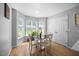 Charming dining area with a bay window offering natural light and a view of the outdoors at 121 Talley Ridge Dr, Holly Springs, NC 27540