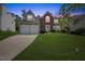 Charming two-story home with a well-manicured lawn and a two-car garage, perfect for Gathering living at 121 Talley Ridge Dr, Holly Springs, NC 27540