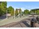 Outdoor playground with a variety of recreational equipment for children to enjoy at 121 Talley Ridge Dr, Holly Springs, NC 27540