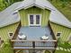 Charming balcony with seating overlooking the landscape, providing a serene outdoor space for relaxation and enjoyment at 123 Beech Forest Way, Pittsboro, NC 27312