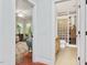 Hallway with doors leading to living room and bathroom at 123 Beech Forest Way, Pittsboro, NC 27312