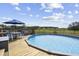 Above ground swimming pool and deck with outdoor seating and dining area at 123 Hawick Ct, Zebulon, NC 27597