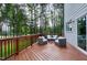 Relaxing outdoor deck with comfortable seating, ideal for enjoying serene views of the surrounding greenery at 1241 Keith Rd, Wake Forest, NC 27587