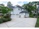Spacious three-car garage and parking area, providing ample space for vehicles and storage at 1241 Keith Rd, Wake Forest, NC 27587