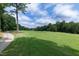 Picturesque golf course view, showcasing the manicured greens and natural beauty of the surroundings at 1241 Keith Rd, Wake Forest, NC 27587