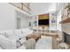 Spacious living room with large built-in shelving, fireplace and an open floorplan at 1241 Keith Rd, Wake Forest, NC 27587