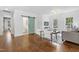 Living room with hardwood floors, a sliding barn door and a comfortable seating area at 1241 Keith Rd, Wake Forest, NC 27587