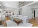 Cozy living room with open layout to the kitchen area, features hardwood floors and bright light at 1241 Keith Rd, Wake Forest, NC 27587