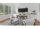 Charming home office with built in cabinets, a large window, and stylish decor at 1241 Keith Rd, Wake Forest, NC 27587