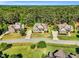 Aerial view of houses with lush green lawns and tree lined streets at 128 Paraggi Ct, Clayton, NC 27527