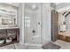 Beautiful bathroom with a glass enclosed shower featuring white subway tile, a corner seat, and a large vanity at 128 Paraggi Ct, Clayton, NC 27527