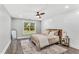 Bedroom with decorative rug, natural lighting, and shiplap wall at 128 Paraggi Ct, Clayton, NC 27527