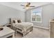 Cozy bedroom featuring a charming window and a bed with a plush, inviting blanket at 128 Paraggi Ct, Clayton, NC 27527