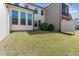 Backyard featuring a grassy lawn, mature trees, and a privacy fence at 1314 Catch Fly Ln, Durham, NC 27713