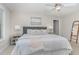 Spacious bedroom with a large bed, soft lighting, and neutral decor creating a relaxing atmosphere at 1314 Catch Fly Ln, Durham, NC 27713