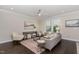 Inviting living room with a ceiling fan, natural light, and neutral decor at 1314 Catch Fly Ln, Durham, NC 27713