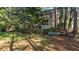 Spacious backyard featuring a screened porch and black metal fence; perfect for outdoor enjoyment at 1401 Marshall Farm St, Wake Forest, NC 27587