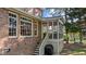 Brick home with a screened porch offering a great backyard space for outdoor entertaining at 1401 Marshall Farm St, Wake Forest, NC 27587