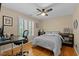 Bedroom with hardwood floors, work space and ceiling fan at 1401 Marshall Farm St, Wake Forest, NC 27587