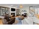 Inviting living room with a fireplace, built-in shelves, and hardwood floors at 1401 Marshall Farm St, Wake Forest, NC 27587