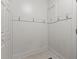Practical mud room with wall hooks and wainscoting, perfect for organizing outerwear at 1401 Marshall Farm St, Wake Forest, NC 27587