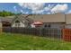 Backyard with privacy fence, green grass, and patio, perfect for outdoor activities and relaxation at 1410 Osborne Dr, Burlington, NC 27215