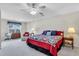 Spacious main bedroom with a ceiling fan and sitting area at 1410 Osborne Dr, Burlington, NC 27215