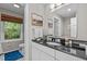 This bathroom features a vanity and a separate room for the toilet, providing convenience and privacy at 1509 Cumberland Rd, Chapel Hill, NC 27514