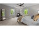 This naturally lit bedroom has carpet flooring and scenic views from the windows at 1509 Cumberland Rd, Chapel Hill, NC 27514