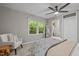 This cozy bedroom is naturally lit with scenic views from the windows and has carpet flooring at 1509 Cumberland Rd, Chapel Hill, NC 27514