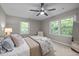 This spacious bedroom is naturally lit with scenic views from the windows and has carpet flooring at 1509 Cumberland Rd, Chapel Hill, NC 27514