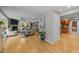 Open-concept living space with hardwood floors, fireplace, and seamless access to the kitchen at 1509 Cumberland Rd, Chapel Hill, NC 27514