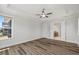 Bedroom with natural light and attached bathroom at 1513 Armscroft Lane, Apex, NC 27502