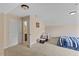 Finished upstairs room with chair, daybed, carpet and vaulted ceilings at 1605 Sassafras St, Durham, NC 27712