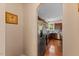 A view of a kitchen, with hardwood floors and stainless steel appliances at 1605 Sassafras St, Durham, NC 27712