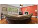 Warm living room filled with natural light, hardwood floors, and modern accents at 1605 Sassafras St, Durham, NC 27712