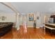 Spacious living room features hardwood floors and a neutral color palette at 1605 Sassafras St, Durham, NC 27712