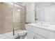 Modern bathroom featuring a glass-enclosed shower, vanity with sink, and stylish fixtures at 1709 Chestnut Falls Rd, Wendell, NC 27591